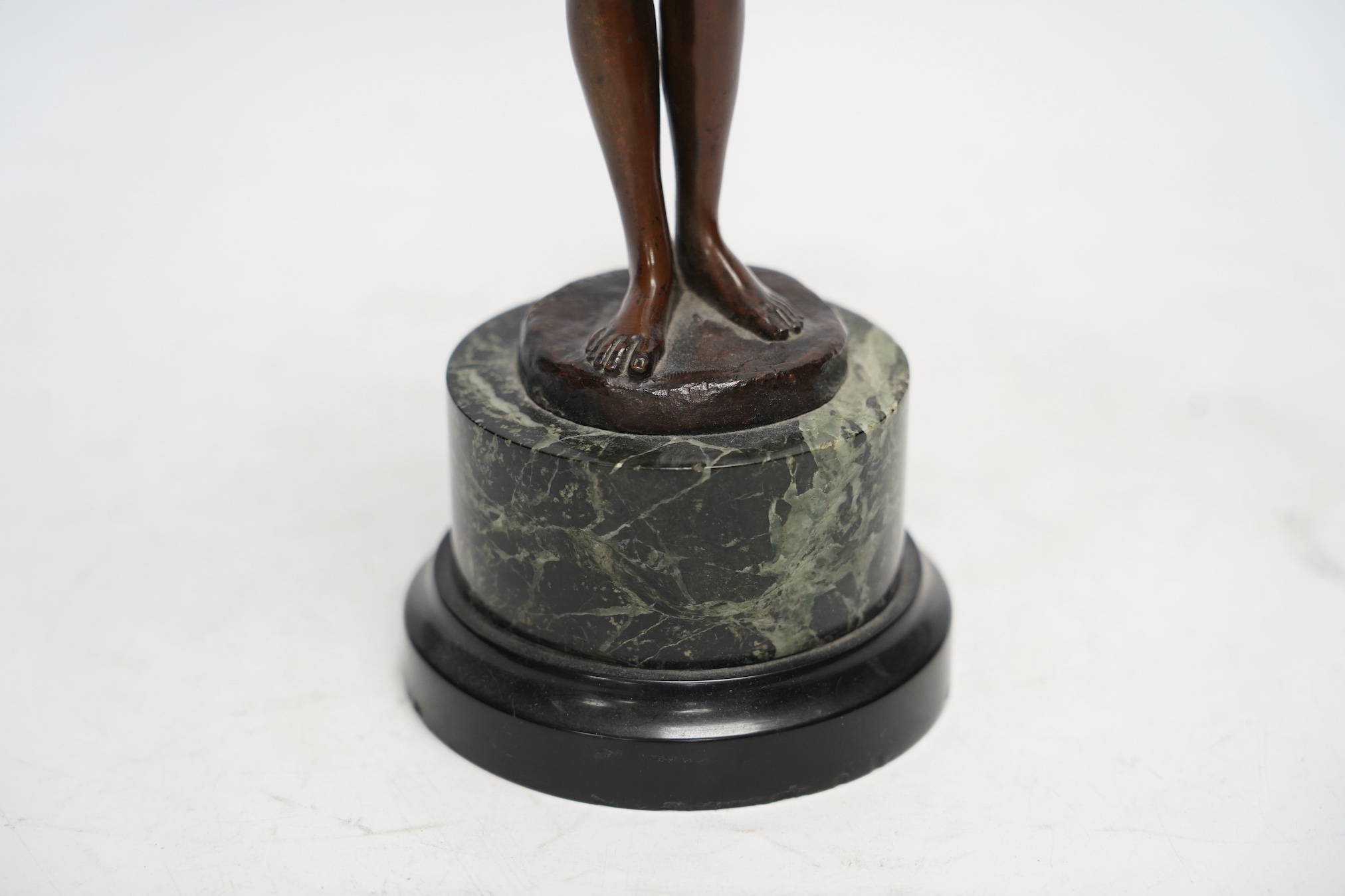 After Eugene Delaplanche (1836 - 1891), a brown patinated figure, La Musique, signed M. Matthias, on serpentine marble base, 31cm